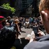 Protesters Pack Trump Tower Terrace To Demand NYC Divest From Fossil Fuels